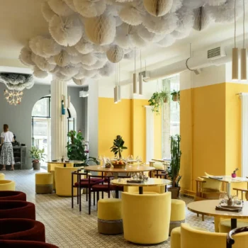 brightly colored restaurant with server in background