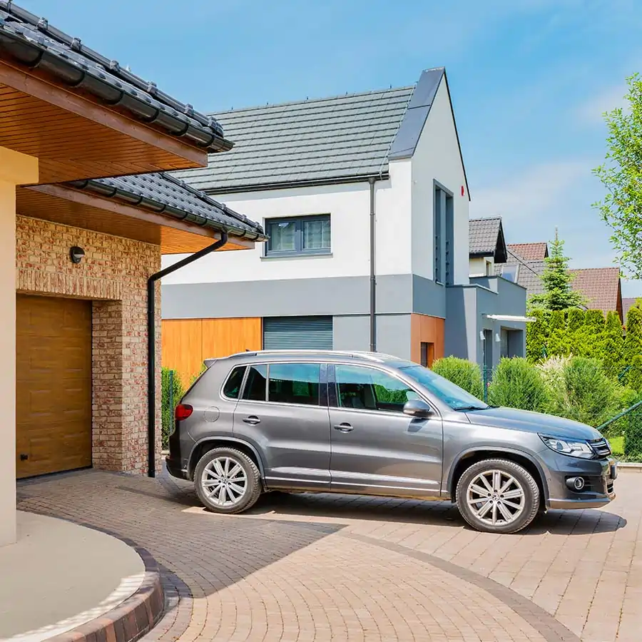 car-parked-driveway (1) Car parked in a driveway.