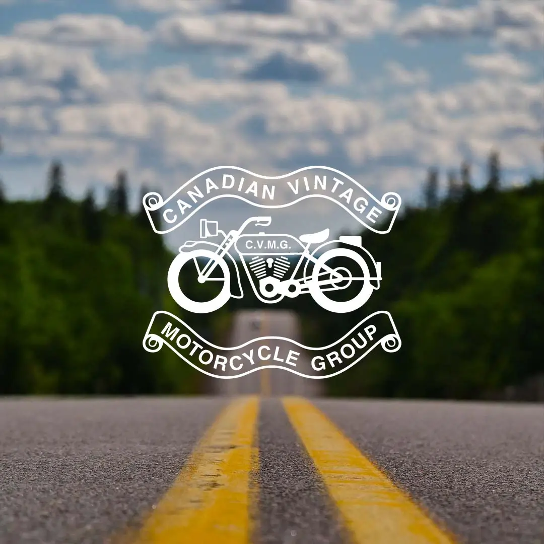 CVMG-landing-page-grid CVMG logo on image of road with double yellow line between forested hills.